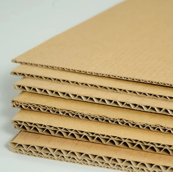 Stacked corrugated cardboard sheets for cushioning and product separation