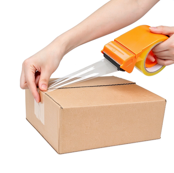 Hand-held tape dispenser sealing a corrugated carton